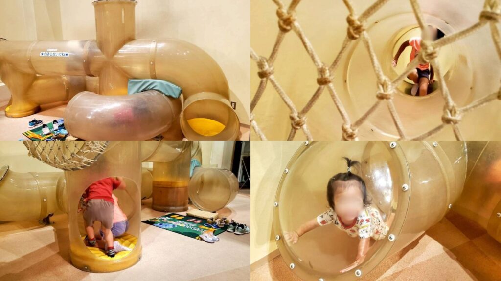 ハムスターのドカンに似た遊具で遊ぶ子どもの画像